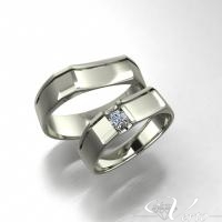 8. Witgouden trouwringen met diamant 0.08ct.  Paar 1420,-