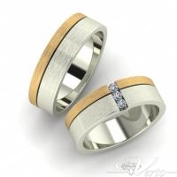 16. Bicolour Trouwringen met diamant. Paar 1395.-