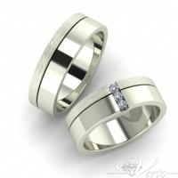 18. Witgouden trouwringen met diamant. Paar 1395.-