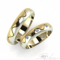 24.Bicolor trouwring Wave met diamant.  1450.-