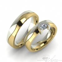 27.Bicolor trouwringen met diamant. Paar 1025.-