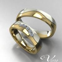 30.Bicolor trouwringen met diamant. Paar 1095.-